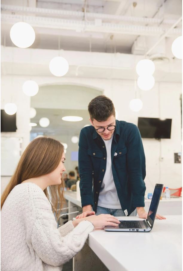 Loan agents discussing startup business loans in the office